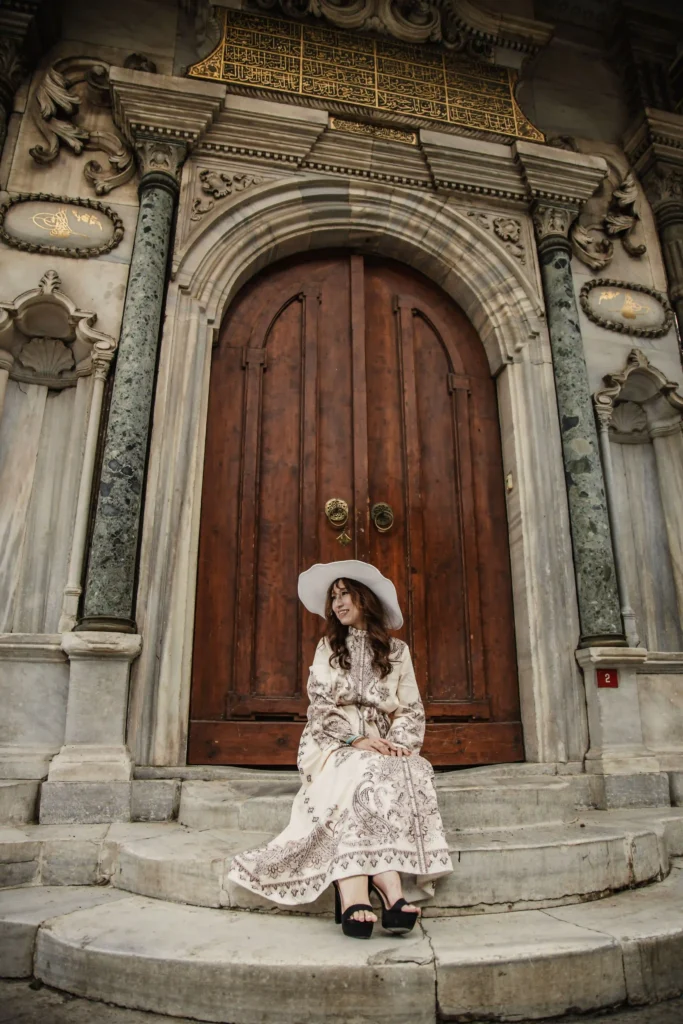 Woman in an elegant patterned outfit for a photoshoot in Istanbul at Hagia Sophia